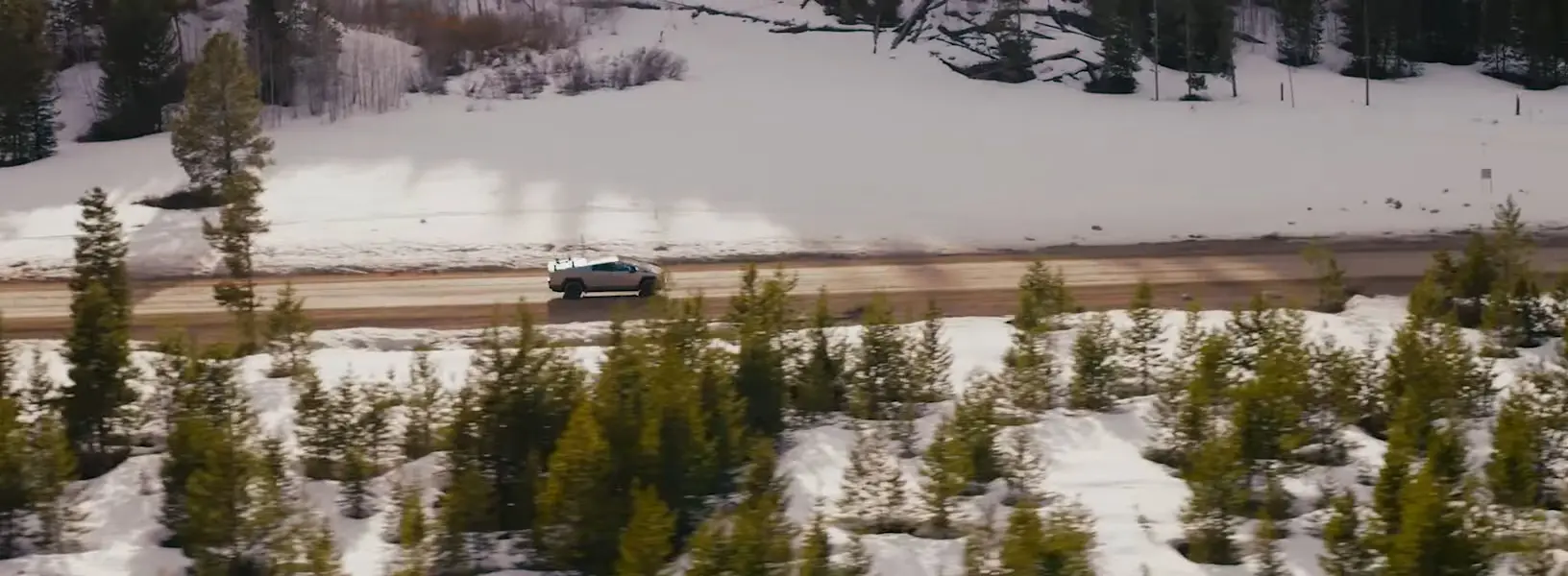 2025-tesla-cybertruck-snow-mountains-car-back-catalogue
