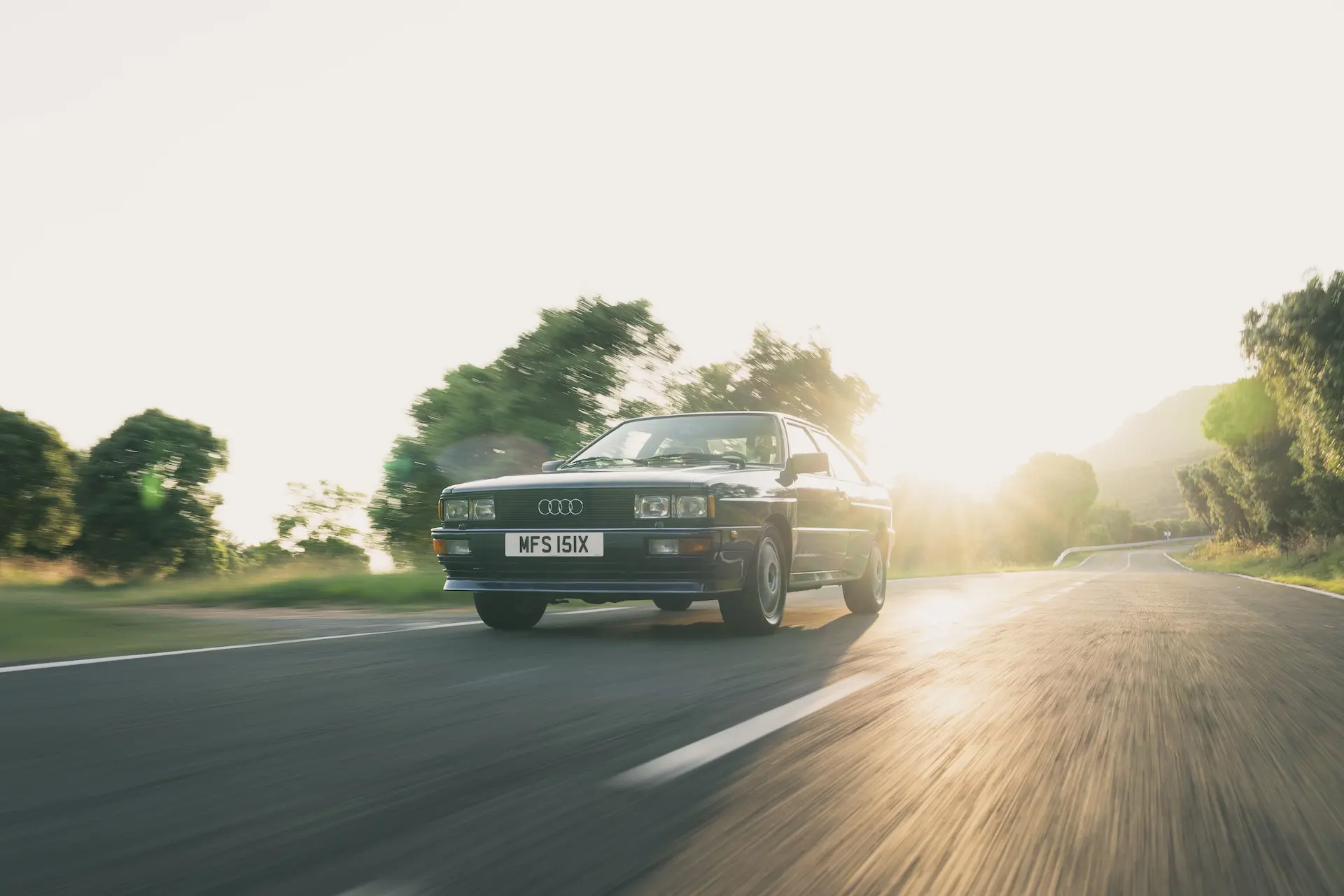 1982-Audi-Quattro-Coupe-frint-qtr-driving-car-back-catalogue
